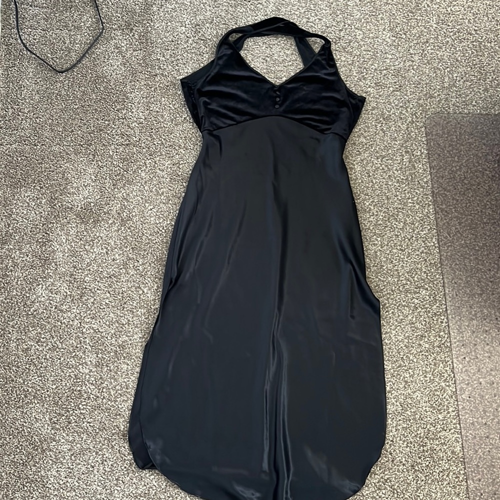 Black satin, tea-length nightgown.